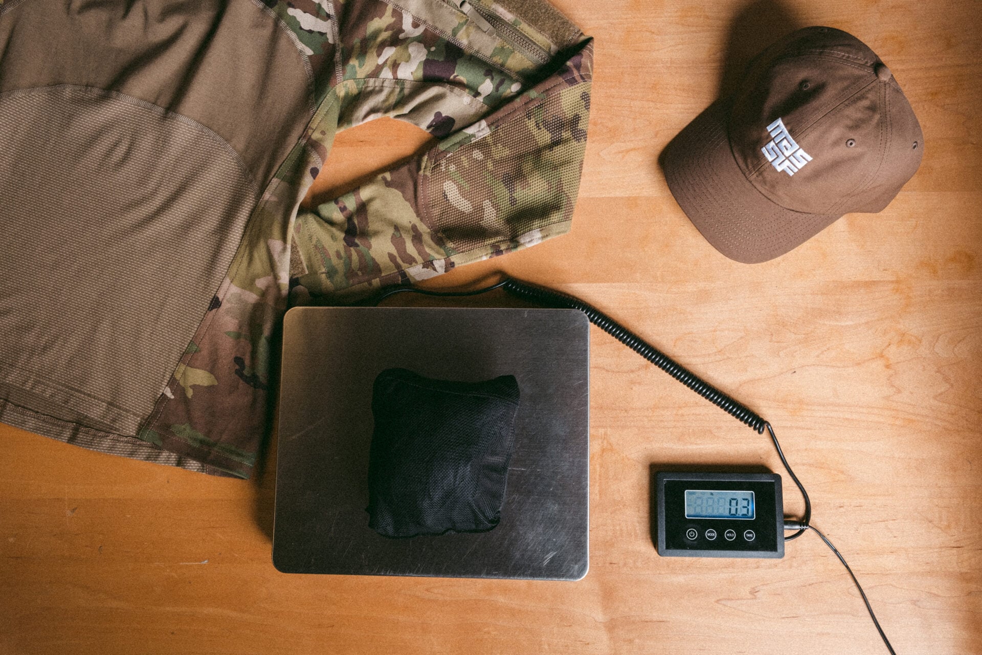 clipper windbreaker stuff sack weight on scale with massif hat and combat shirt